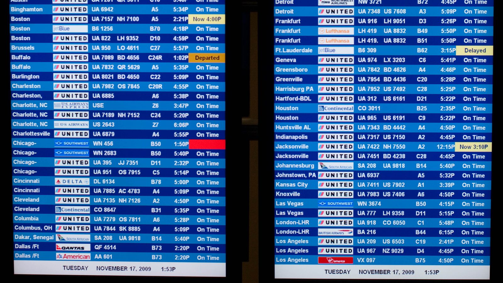 Airport departure and arrival board showing international destinations